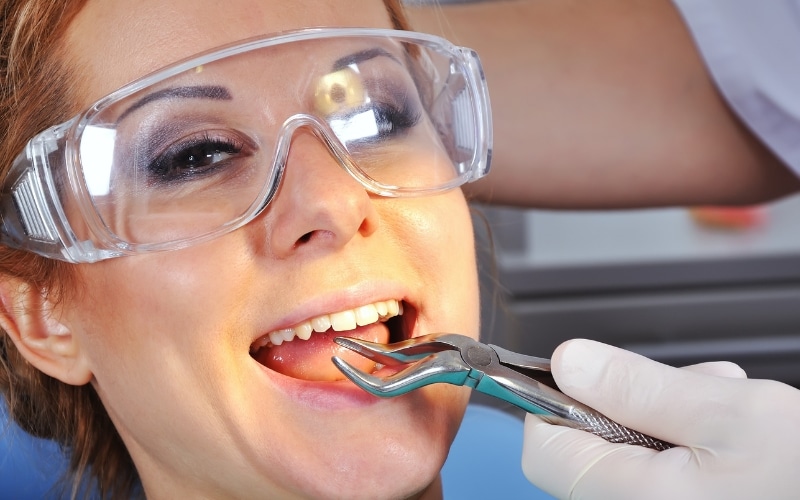 Featured image for “How Painful is Tooth Extraction Without Anesthesia?”